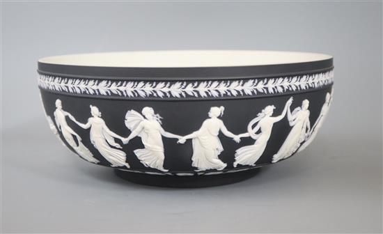 A Wedgwood Dancing Hours black jasperware bowl, 20th century designed by John Flaxman D. 26cm